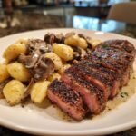 Black Pepper Ribeye with Creamy Mushroom Alfredo Gnocchi