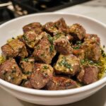 Romige biefstukpuntjes met kruidenboter